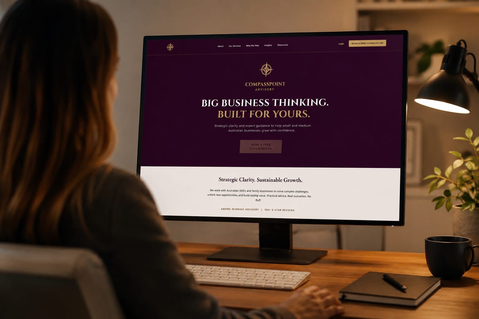 The CompassPoint Advisory website open on a desktop monitor